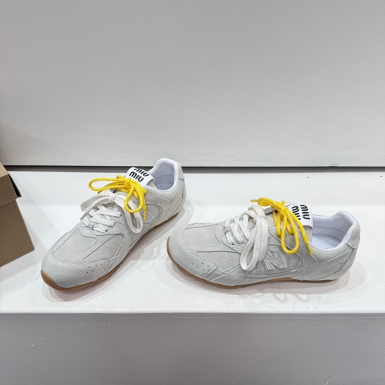 20240403 310 Co branded NB Couple Sports Shoes New Bailun Co branded Sports Shoes have become popular on major global purchasing websites. In 2024, Maillard's color scheme flat shoes, which were exposed on the runway and very popular, have a unique style 