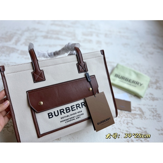 2023.11.17 205 Boxless size: 34 * 25cm (large) bur Freya canvas tote (tote) has a square and upright appearance with a retro academic atmosphere. The flip outer bag design is suitable for storing small items such as keys and cards, which is very practical