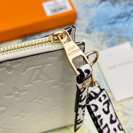 20230908 68706 Leopard Print White Mlanie Medium Handheld Bag is made of soft Monogram Imprente leather with a slight appearance of Monogram embossing on the surface. It is paired with a detachable wristband, V-shaped front pocket, and clip to showcase a 