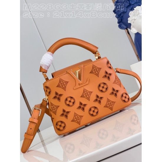 20231125 P1520 [Exclusive live shot M22863 earth yellow embroidery/mini] This Capuchines mini handbag was created by Nicolas Ghesquire and highlights the LV Broderie Anglaise theme of the brand's early autumn 2022 collection. The cow leather bag is embell