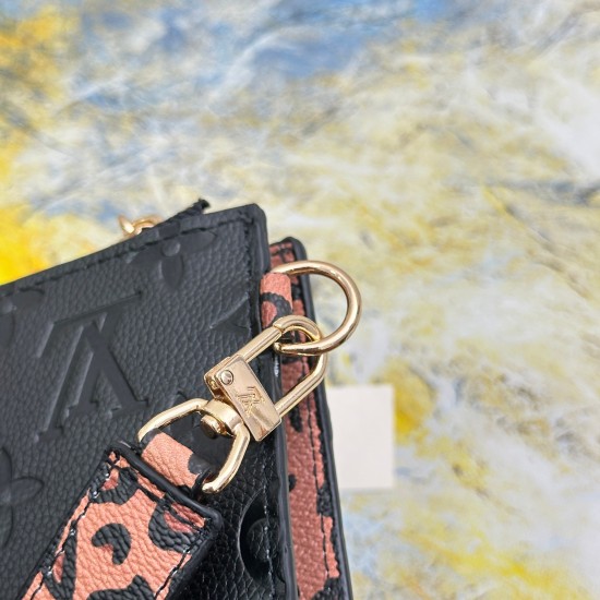 20230908 68706 Leopard Print Black Mlanie Medium Handheld Bag is made of soft Monogram Imprente leather with a slight appearance of Monogram embossing on the surface. It is paired with a detachable wristband, V-shaped front pocket, and clip to showcase a 