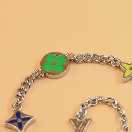 2023.07.11  LV Sunrise Bracelet This LV Sunrise Bracelet exudes the vibrant vitality of spring with colorful colors. Colorful glass embellishments with painted Monogram flowers, paired with adjustable chains, make it an elegant choice for layering with ot