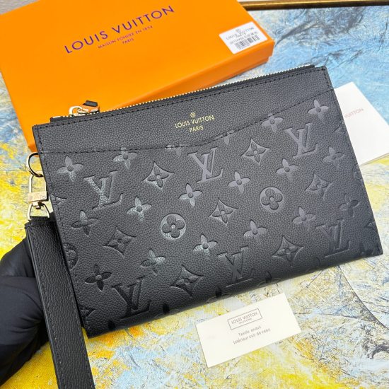 20230908 68706 Mlanie Medium Handheld Bag is made of soft Monogram Imprente leather, with a slight appearance of Monogram embossing on the surface. It is paired with a detachable wristband, V-shaped front pocket, and clip to showcase a fusion of elegance 