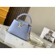 20231125 P1200 [Premium Original Leather M59709 Light Pink Blue with Rice Platinum Buckle] This Capuchines mini handbag is made of bright Taurillon leather, intertwined with the chain to showcase its craftsmanship. The chain can be easily removed or adjus
