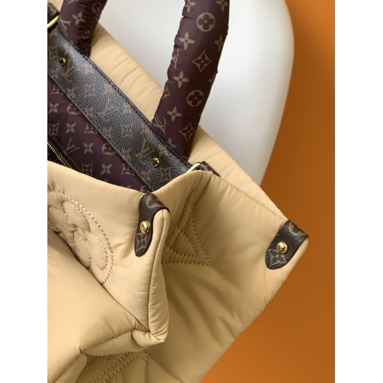 20231126 p670M59005 Black Silver Dark Green M59007 Apricot OnTheGO Large Handbag features Econyl recycled nylon, showcasing the Louis Vuitton EcoDesign action philosophy. Monogram embroidered patterns combined with padded texture provide ample space to me