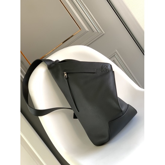 20240325 P1050 Lo * we New Anton Backpack Arrived ✌️ This is a functional streamlined suspension bag made of soft grain calf leather, with an adjustable leather strap and a zippered top design. It can be folded when in use and can be secured with a snap f