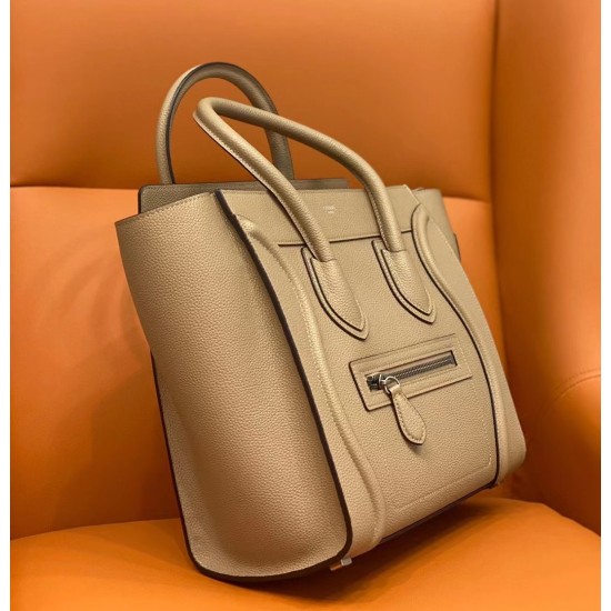 20240315 P1140 CELIN * Lugage Micro Smiling Face Bag 167793_ Milk Tea Color is made of imported calf leather grain surface/with leather handle, 1 zipper buckle, and 1 external zipper pocket on the front. Handheld, zipper locked, inner zipper pocket and do