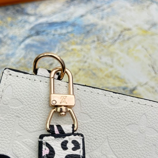 20230908 68706 Leopard Print White Mlanie Medium Handheld Bag is made of soft Monogram Imprente leather with a slight appearance of Monogram embossing on the surface. It is paired with a detachable wristband, V-shaped front pocket, and clip to showcase a 