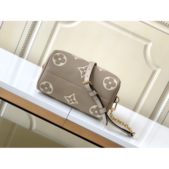 20231125 p700 M46575 Gray M46397 Milk White M58953 Black M58958 Pearl Blue is made of dual tone Monogram Imprente leather, decorated with LV logo and Monogram floral pattern. This Speedy Bandoulire 20 handbag is a modern classic. The design inspiration co