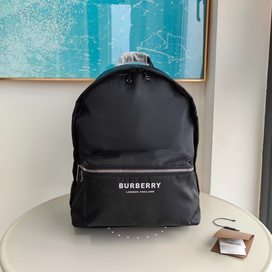 2024.03.09p650 Burberry Backpack, featuring a brand new ECONYL material decorated with a logo. Paired with smooth leather trim, the shoulder straps are embellished with a Burberry lettering logo embroidered with jacquard. ECONYL is a sustainable nylon fab