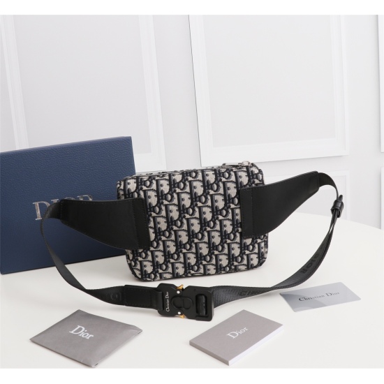 20231126 510 This saddle waist bag has practical functions and a modern style. Crafted with beige and black Oblique printed fabric, embellished with black grain leather details, the front magnetic flap pocket highlights the iconic saddle silhouette, and a