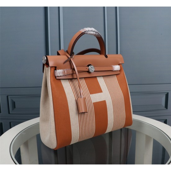 20240317 (inner seam H brown) Herm è s Herdag imported waterproof canvas series Shipping batch: 650 Cabag is a classic work of Herm è s canvas series, with a simple appearance, large capacity, fashionable yet not flashy. It is made of original imported ca