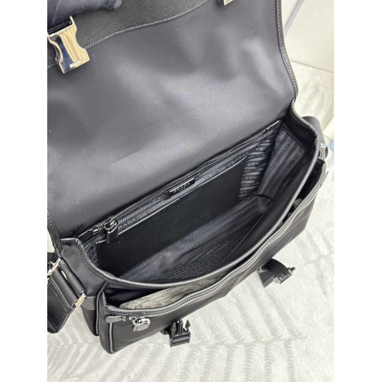 2024.03.12 P710 New Men's Crossbody Bag, Large Postman Bag, Comes with Small Bag 2VD768. This nylon flap handbag is adorned with classic Saffiano leather trim, equipped with two side buckles and the iconic triangular metal logo, showcasing a fashionable d