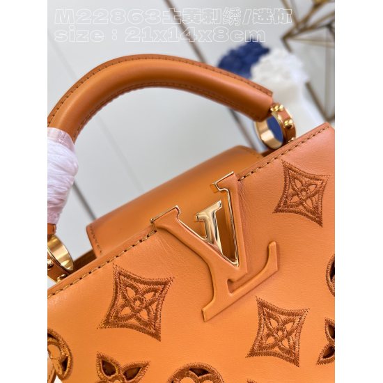20231125 P1520 [Exclusive live shot M22863 earth yellow embroidery/mini] This Capuchines mini handbag was created by Nicolas Ghesquire and highlights the LV Broderie Anglaise theme of the brand's early autumn 2022 collection. The cow leather bag is embell