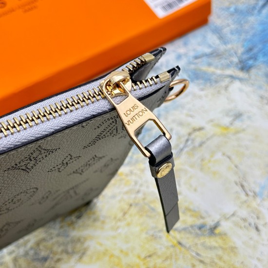20230908 68706 Laser Hole Silver Mlanie Medium Handheld Bag is made of soft Monogram Imprente leather, with a laser hole on the surface that is now Monogram. It is paired with a detachable wristband, V-shaped front pocket, and clip to showcase a blend of 
