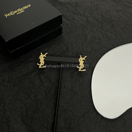 On July 23, 2023, the Saint Laurent YSL earrings are made of original brass material, elegant, abstract, and bold, making them a must-have for trendsetters.