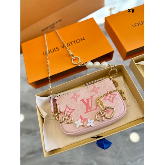 2023.10.1 Lv Little Mahjong P160MINI POCHETTE ACCESSOIRES Hand Bag 2022 Summer By The Pool Capsule Series is first made of MonogramImprente leather with gradient tones to depict Monogram embossing. The Monogram embossing can be hung on a chain in a handba