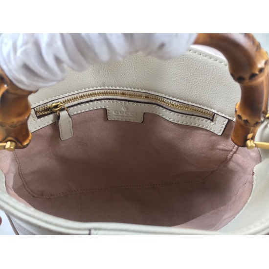 July 20th, 2023, Gucci Diana Bamboo Joint Small Shoulder Backpack. This Gucci Diana bamboo joint handbag combines two recognizable brand elements: a bamboo joint handle and dual G accessories. This accessory is crafted with orange leather craftsmanship, p