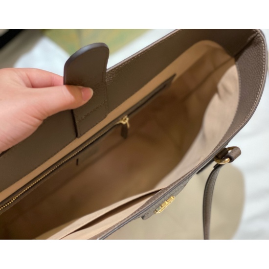 On March 3, 2023, the top of the 190 Boxeless GG Ophidia Tote Bag shopping bag is paired with brown cowhide and stitching in the same color scheme. The size is approximately: 47 wide on top * 37 * 28cm on the bottom